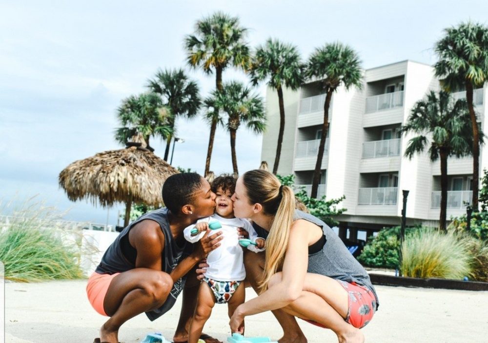lesbian parents kissing toddlers cheeks lesbian parents kissing toddlers cheeks