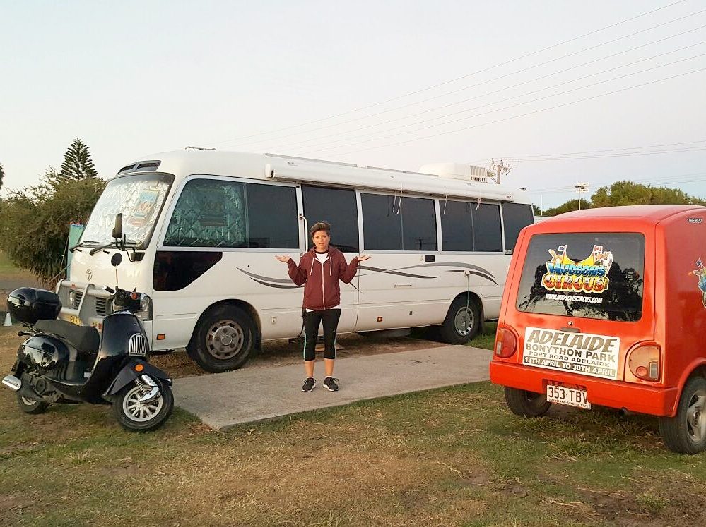 Jot in front of a bus Jot in front of a bus