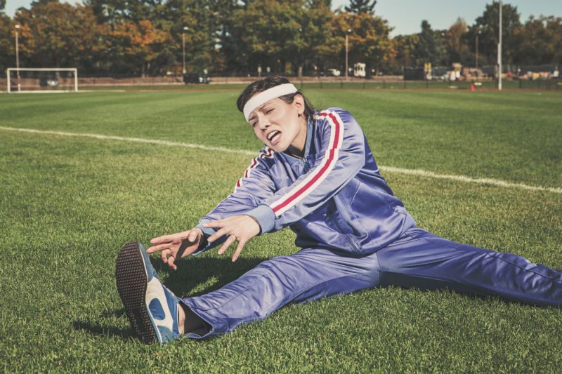 Woman stretching in park