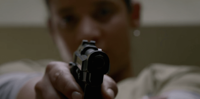 Daya (Dascha Polanco) aiming a gun at corrections officer Thomas Humphrey (Michael Torpey). Daya (Dascha Polanco) aiming a gun at corrections officer Thomas Humphrey (Michael Torpey).